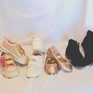 4 pairs of size 8 toddler shoes.